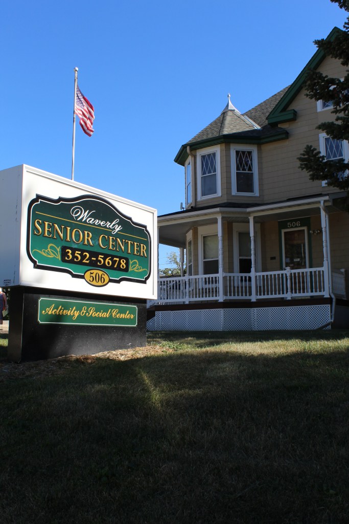 a photo of the Waverly Senior Center building and signage in the yard